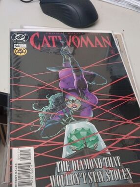 DC Catwoman Comic with Purple Costume and Green Gem